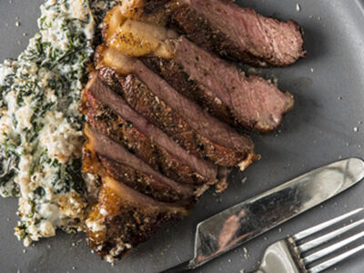 Traeger's Reverse Seared Rib-Eye With Baked Creamed Greens