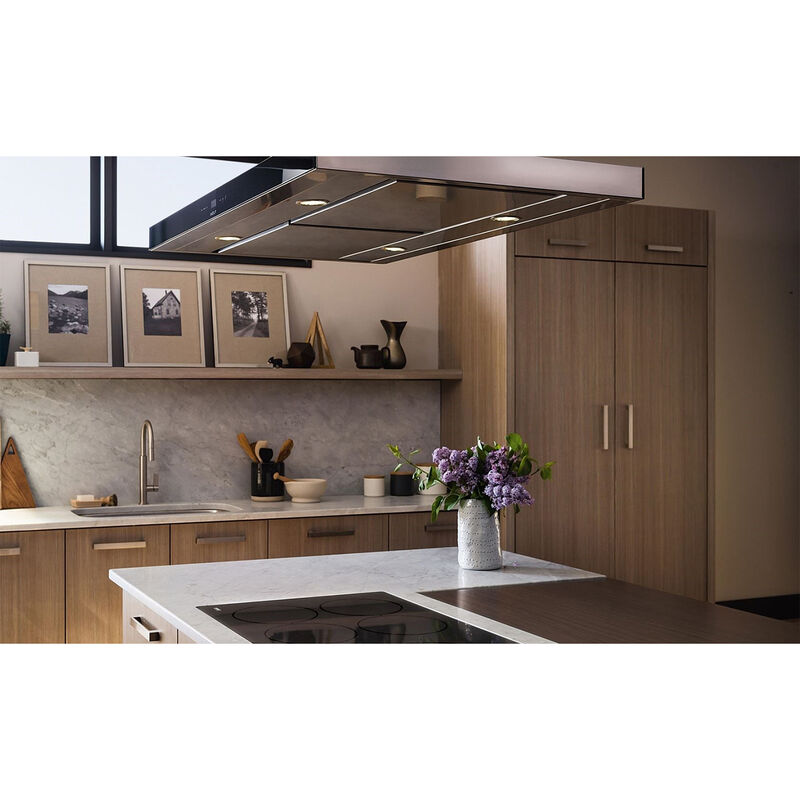 Sub-Zero DEC2450R-L Designer Series Built-In Freezerless Refrigerator shown in a luxury built-in kitchen setting