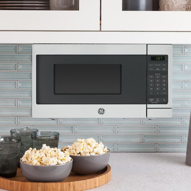 GE Spacemaker 17 in. 0.7 cu. ft. 700W Countertop Microwave - Stainless Steel, Stainless Steel, hires
