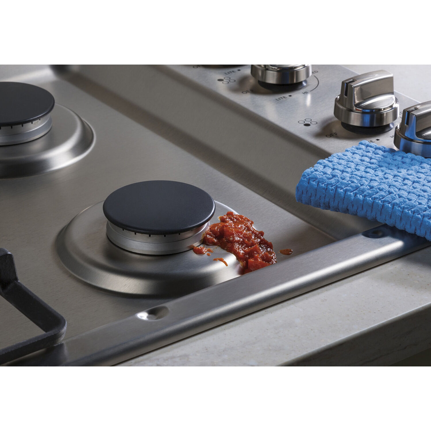 cleaning ge gas stove top