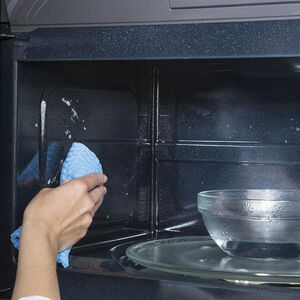 GE 30 in. 1.9 cu. ft. 1000W Over-the-Range Microwave with 400 CFM & Sensor Cooking - Black Slate, Black Slate, hires