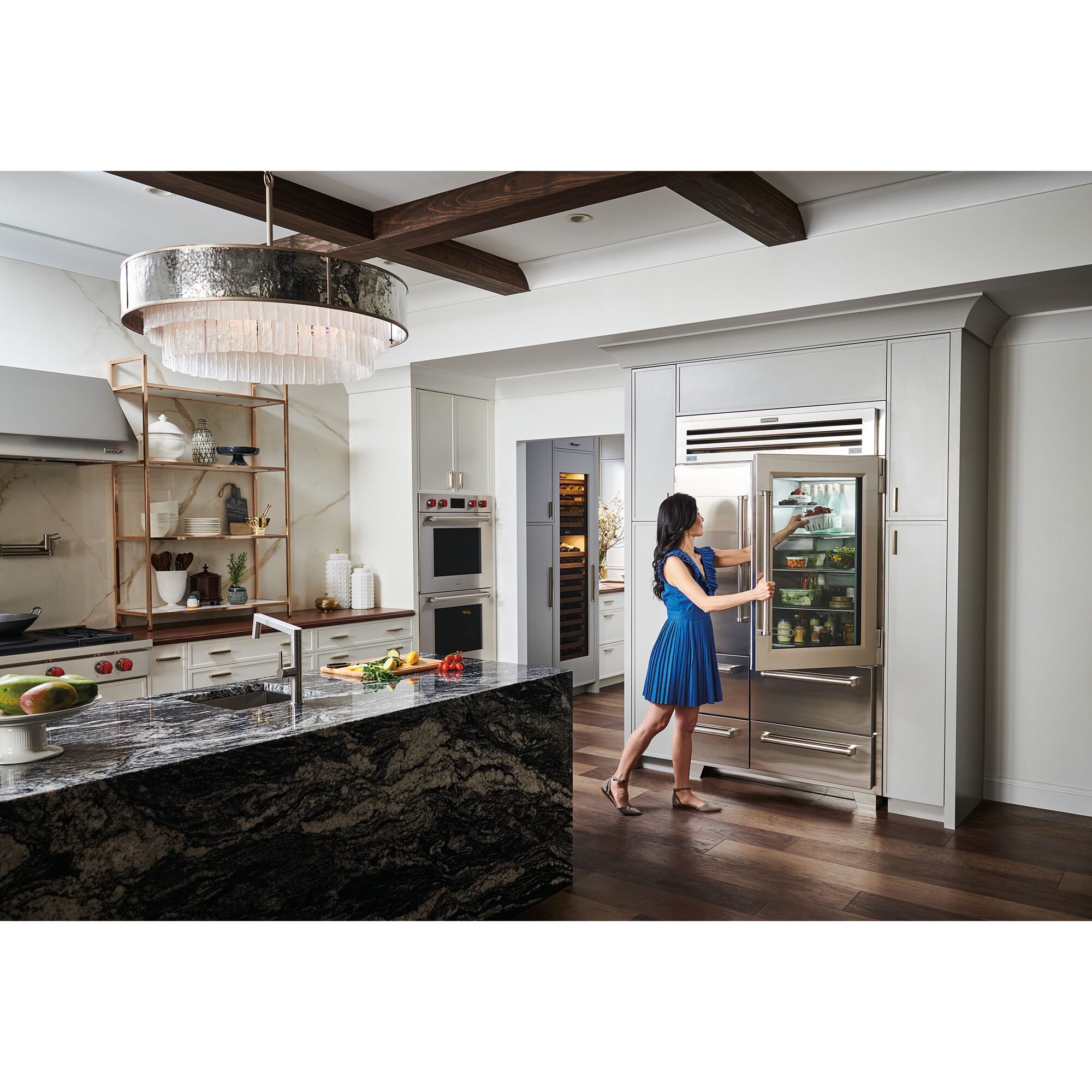 Sub-Zero PRO4850G Pro Series Built-In Side-by-Side Refrigerator shown in a luxury built-in kitchen setting