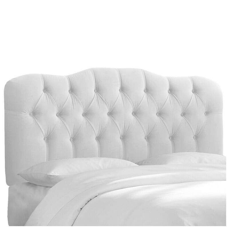 White velvet tufted shop headboard