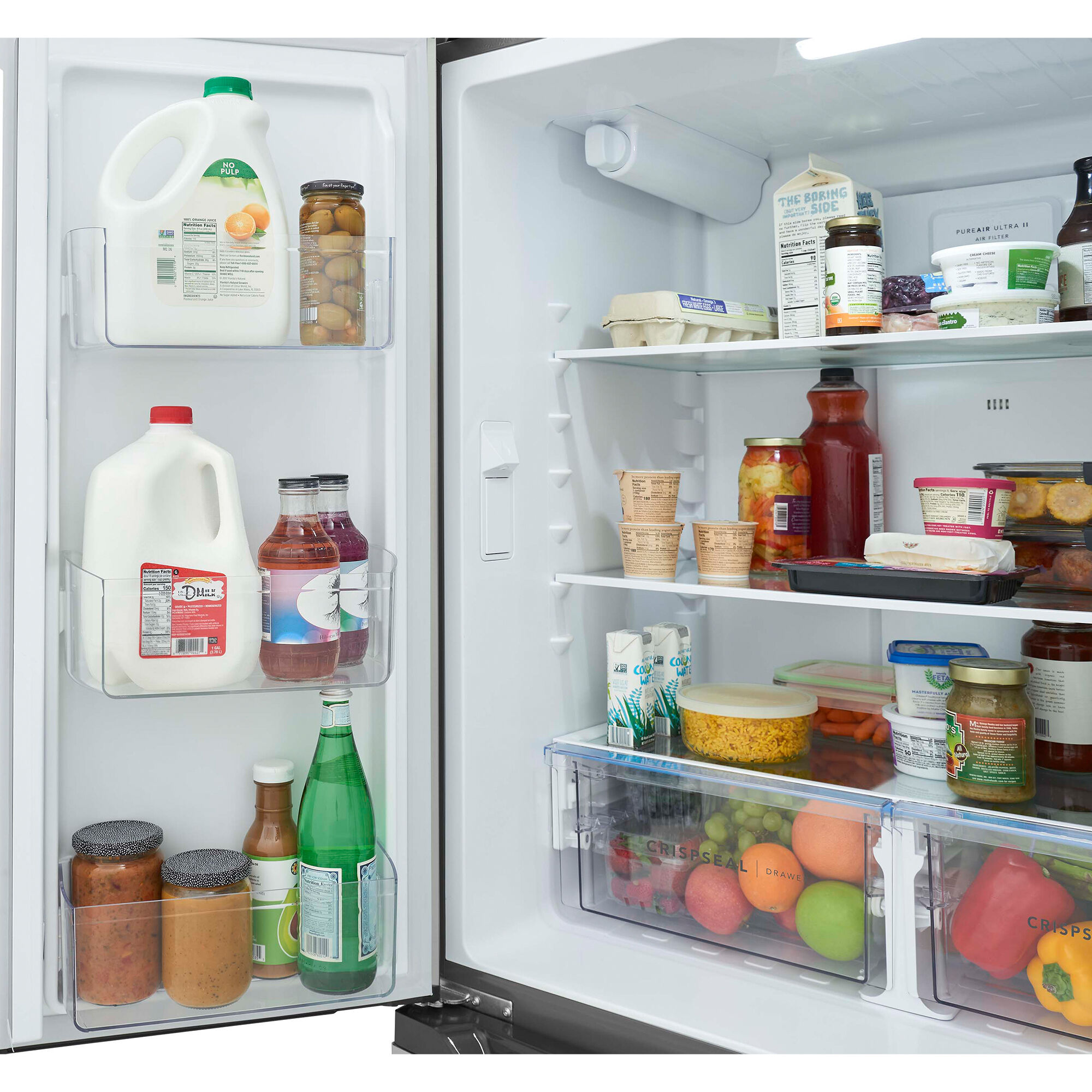 Interior view of the Frigidaire FRFG2011AV showing adjustable glass shelves and door bins.