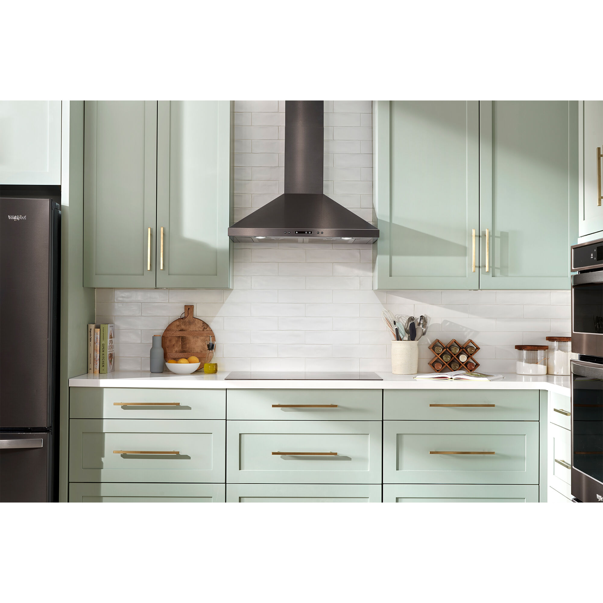 Detail view of the fingerprint-resistant stainless steel finish on the Whirlpool WVW93UC0LZ range hood.