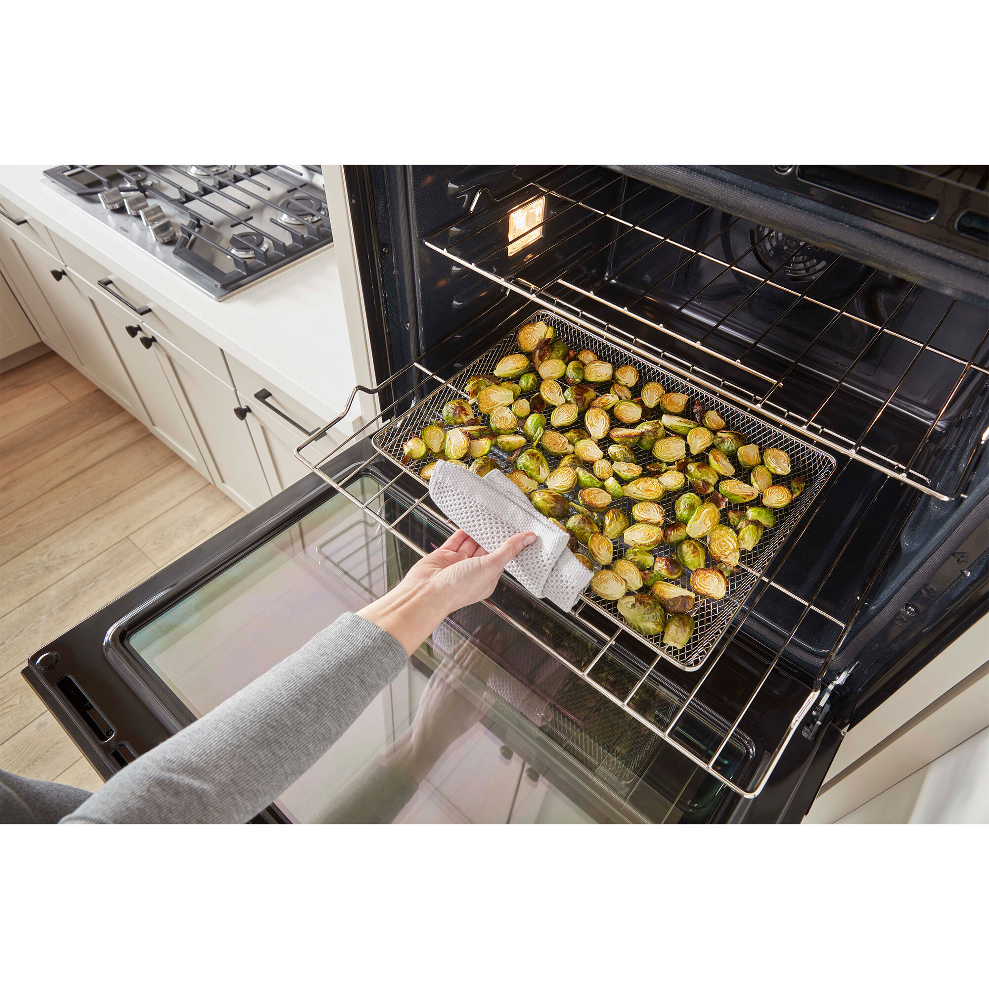 Whirlpool WOEC5930LZ lower oven interior with air fry mode in use.