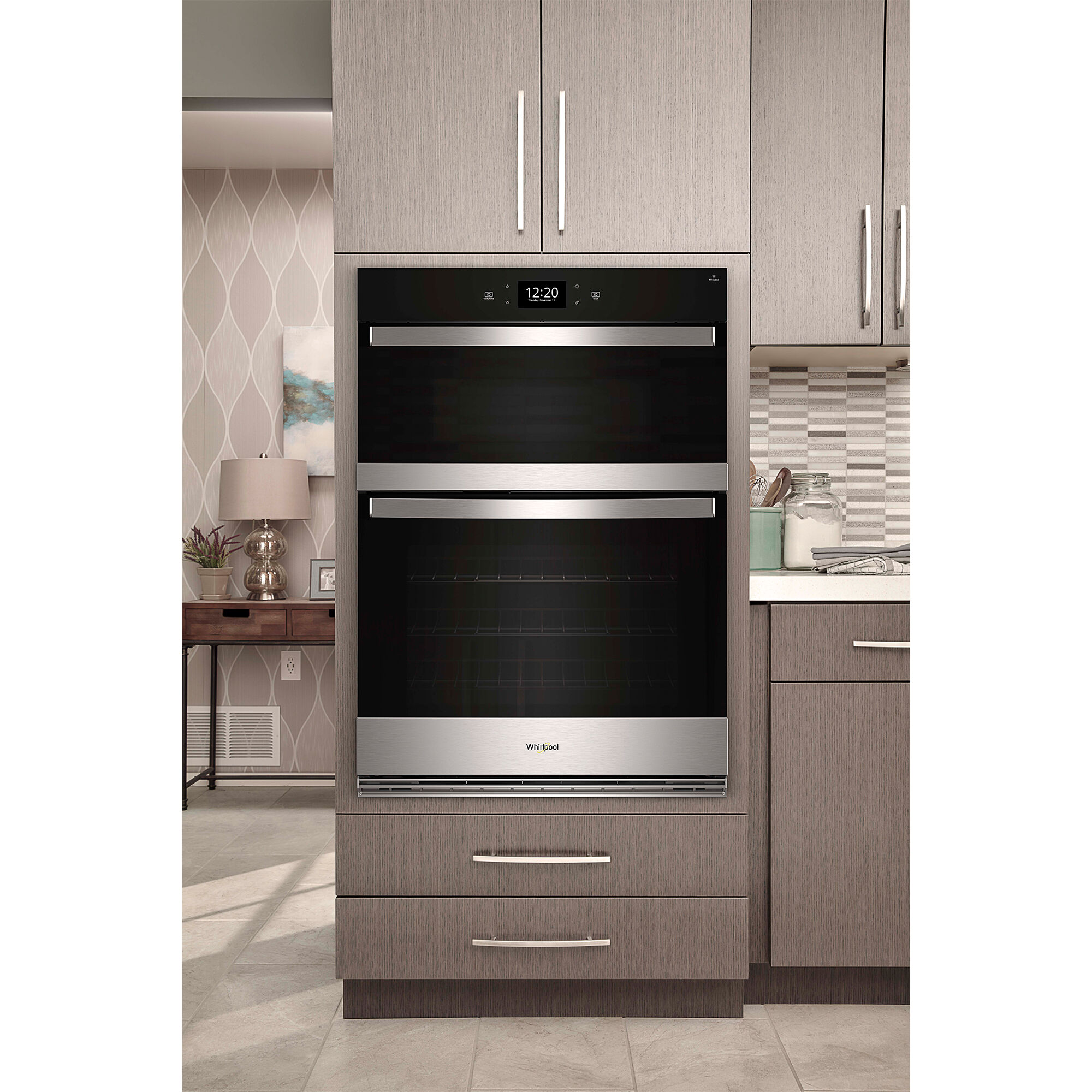 Close-up of the Whirlpool WOEC7030PZ wall oven microwave combo exterior in Fingerprint Resistant Stainless Steel, showing a clean smudge-resistant surface.