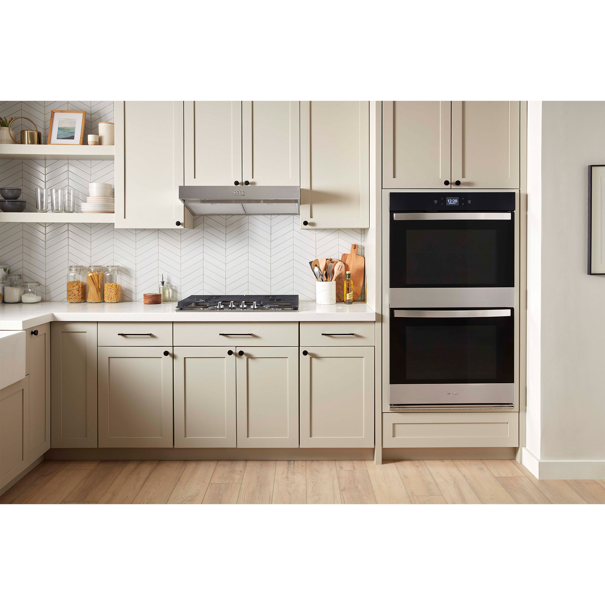 Close-up of the Whirlpool WOED5030LZ fingerprint resistant stainless steel finish and handle detail.