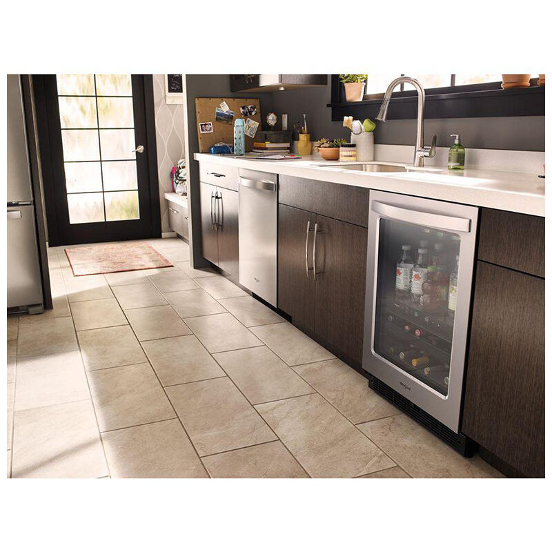 Whirlpool WUB50X24HZ beverage center installed flush in kitchen cabinetry showing built-in stainless steel design.
