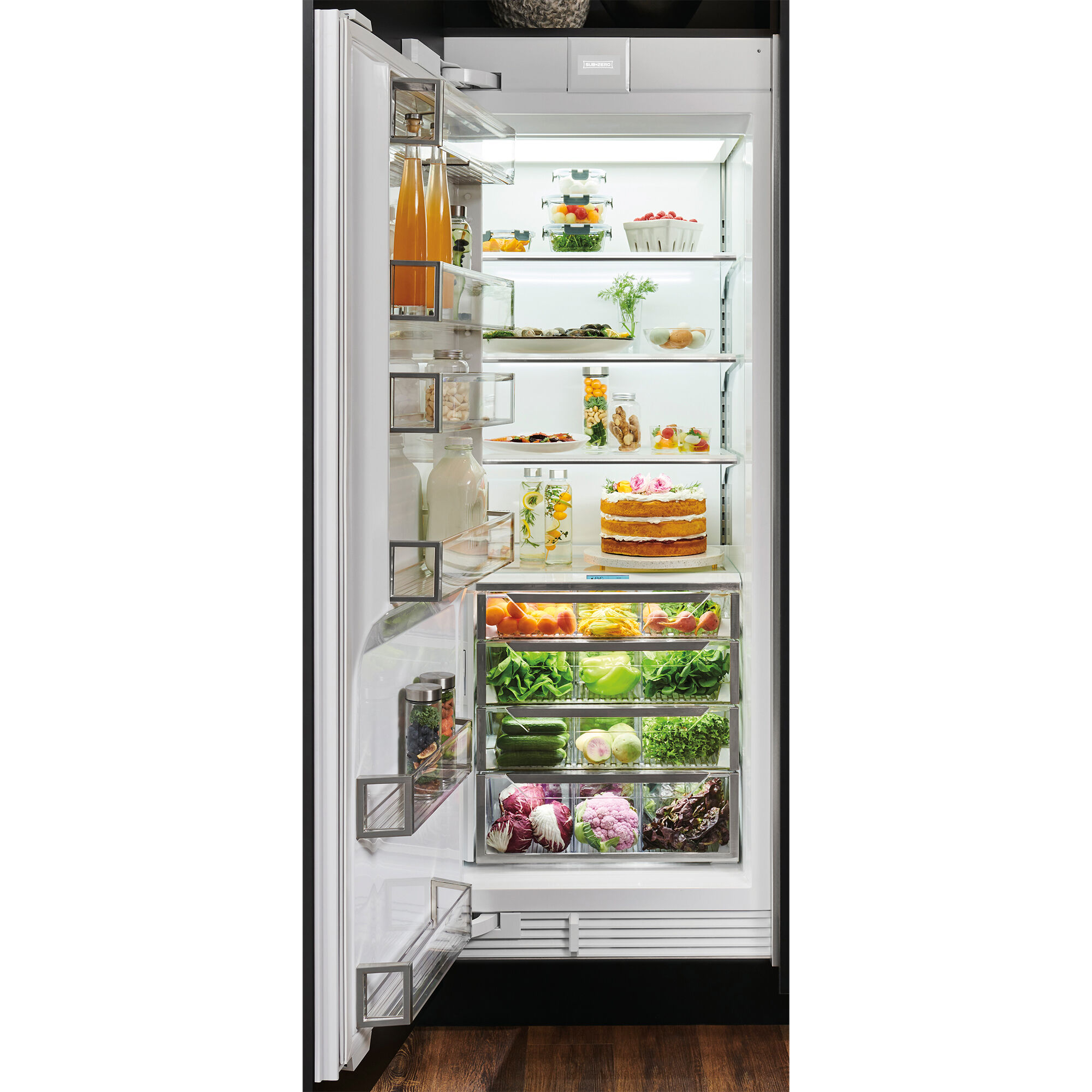 Interior view of Sub-Zero DEC3050R/L showing adjustable shelving, crisper drawers, and door bins