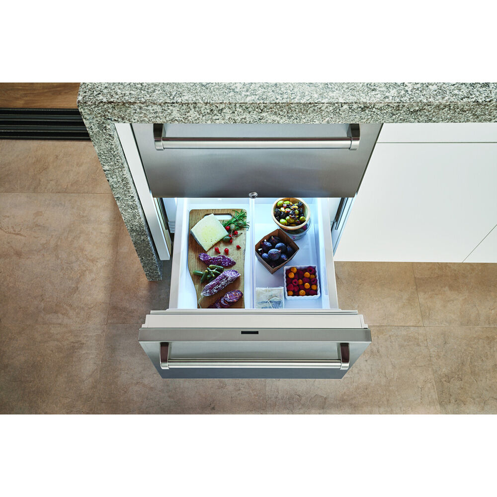 Interior view of Sub-Zero ID24RO showing dual refrigerator drawers with independent temperature zones