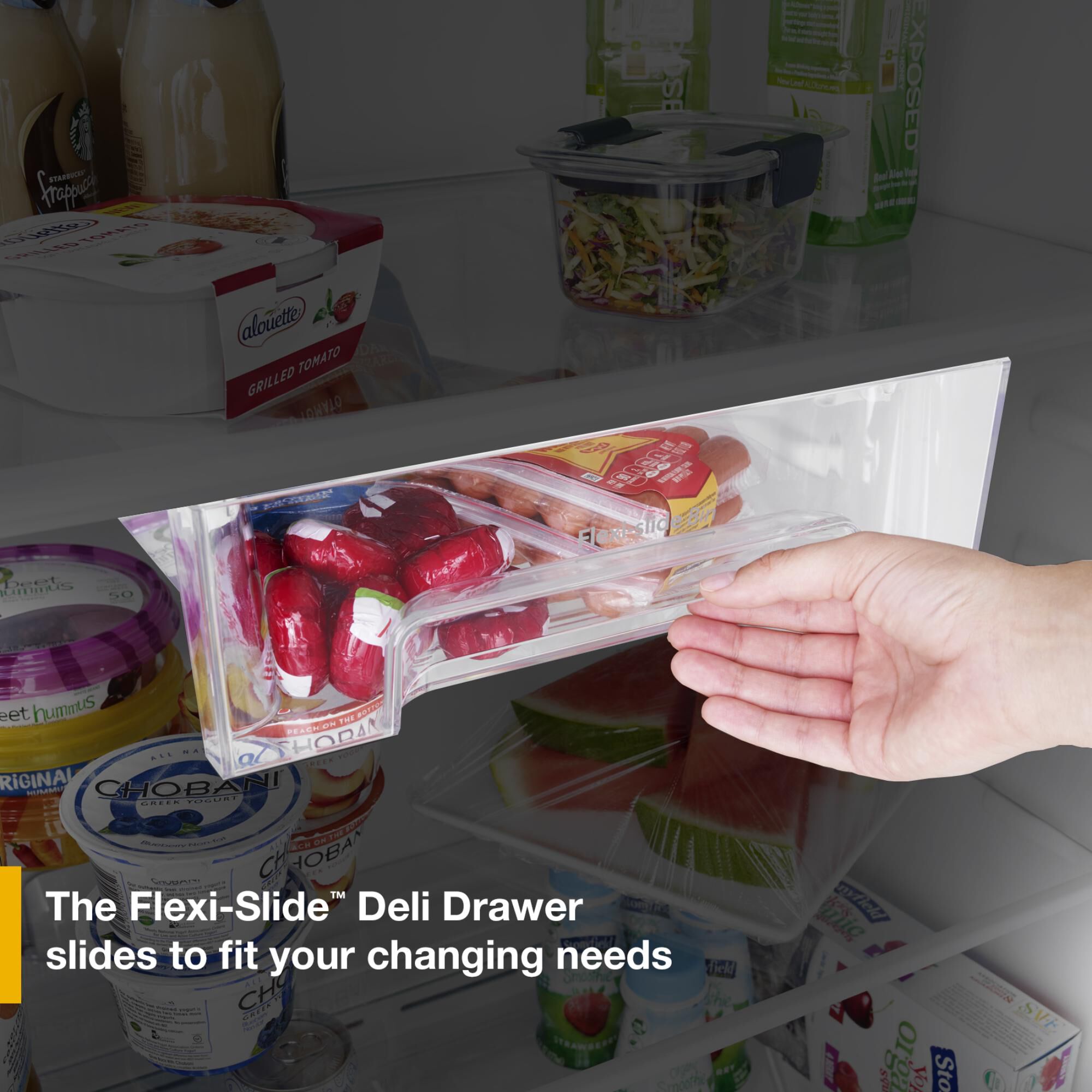 Hand pulling out the Flexi-Slide Deli Drawer on Whirlpool WRTX3314TW refrigerator, showing sliding drawer with packaged deli items inside.