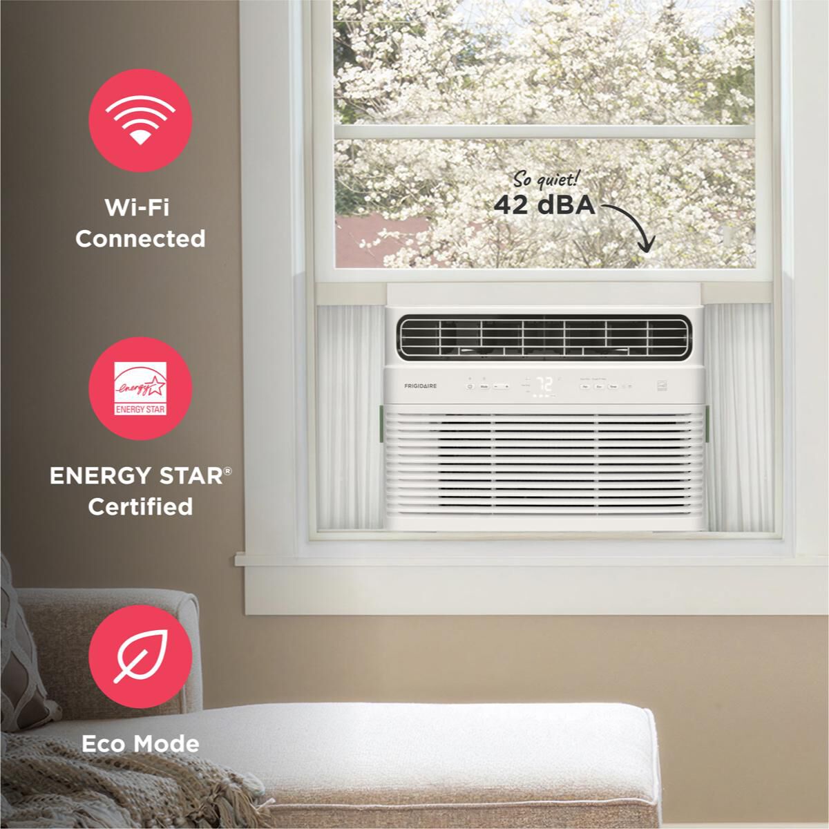 Frigidaire FHWW145WE1 window air conditioner installed in a sunlit window. Icons highlight Wi-Fi connectivity, ENERGY STAR certification, and Eco Mode. Text reads So quiet! 42 dBA.