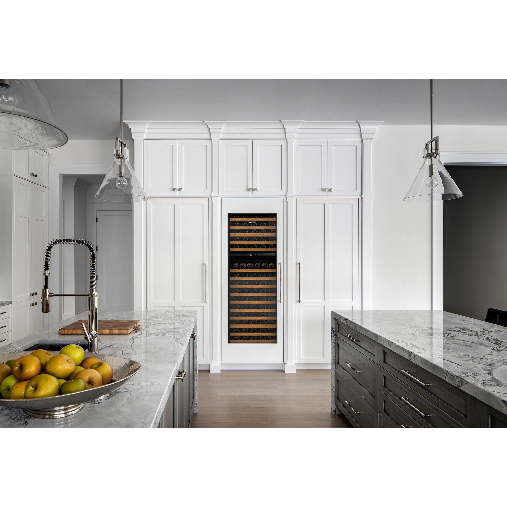 Sub-Zero DEC3050RID-R Designer Series Freezerless Refrigerator with Internal Water Dispenser shown in a luxury built-in kitchen setting