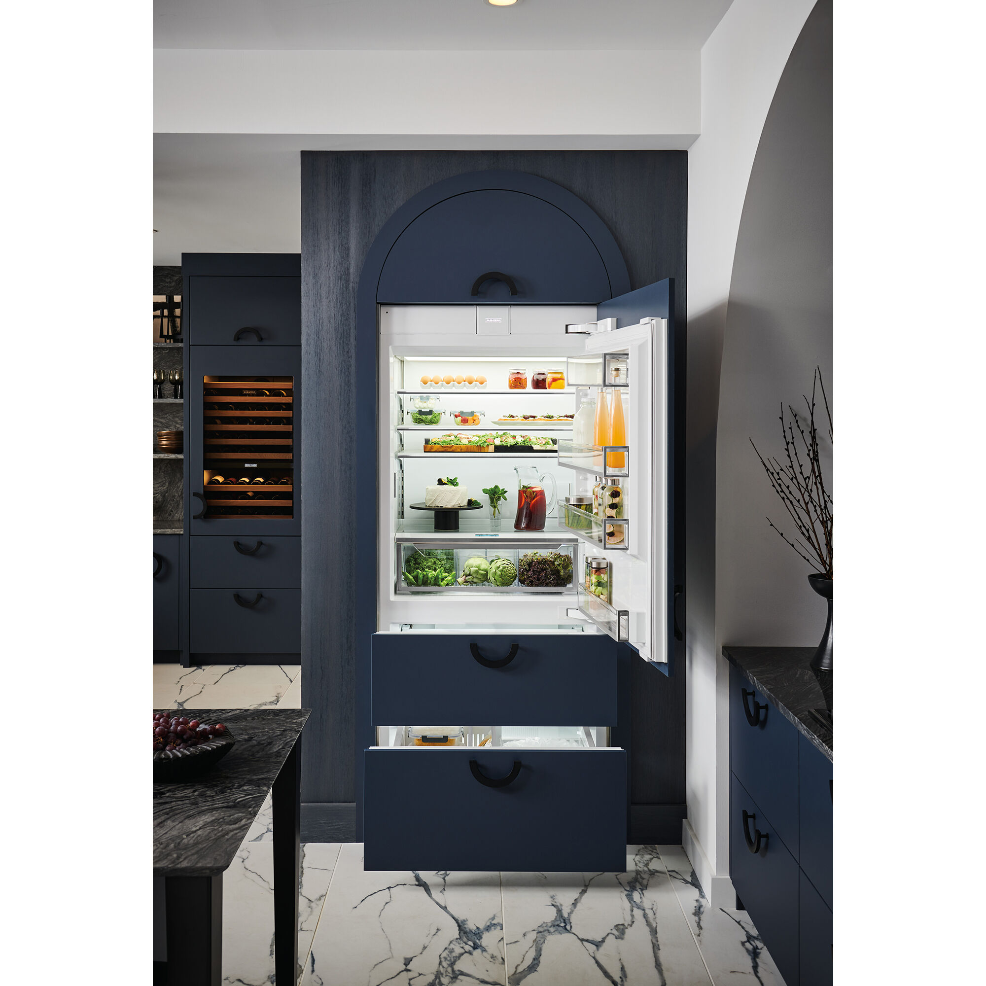 Interior view of Sub-Zero DET3650CIIDR showing ClearSight LED lighting and adjustable shelving