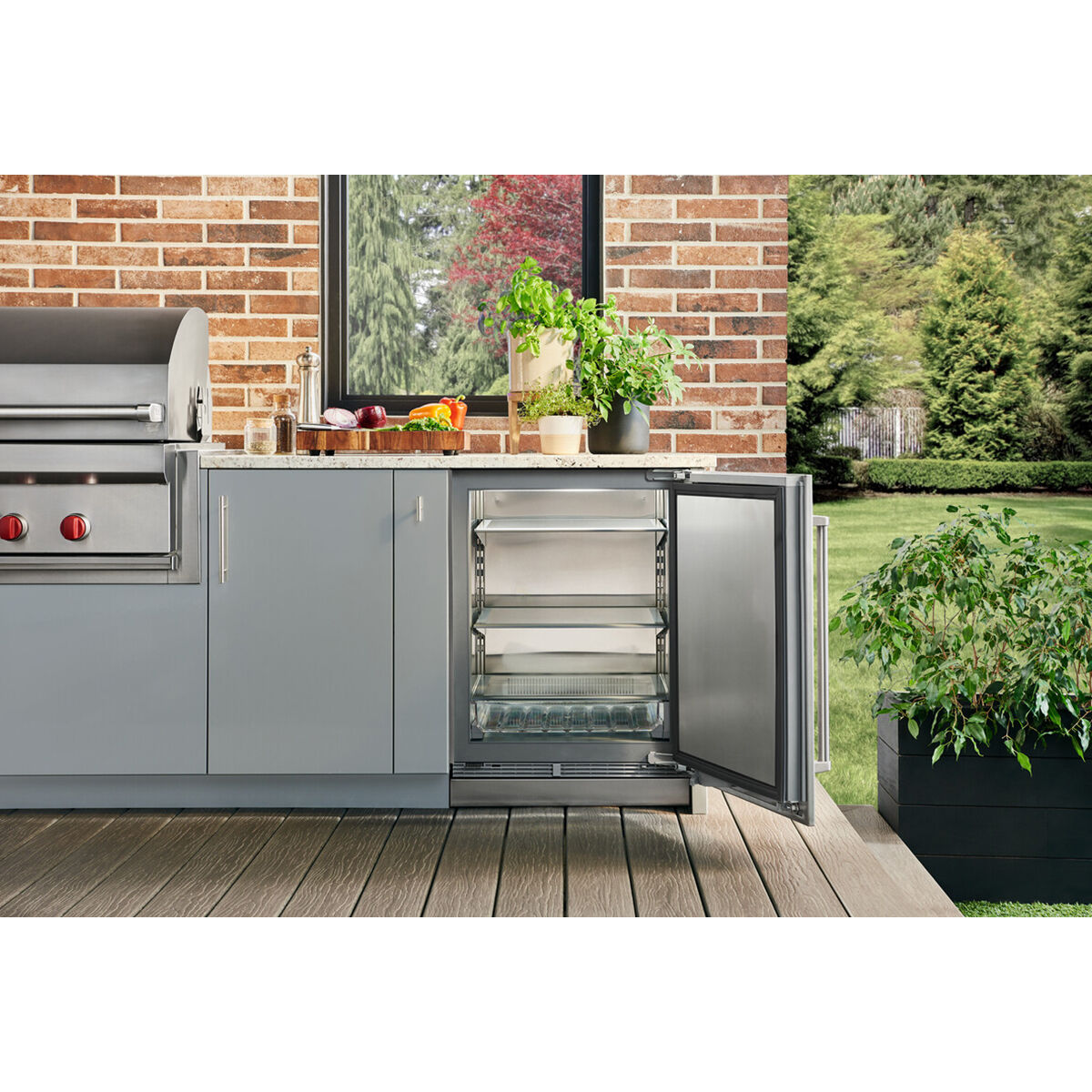 Interior view of Sub-Zero DEU2450RO/R showing stainless steel interior and adjustable shelving