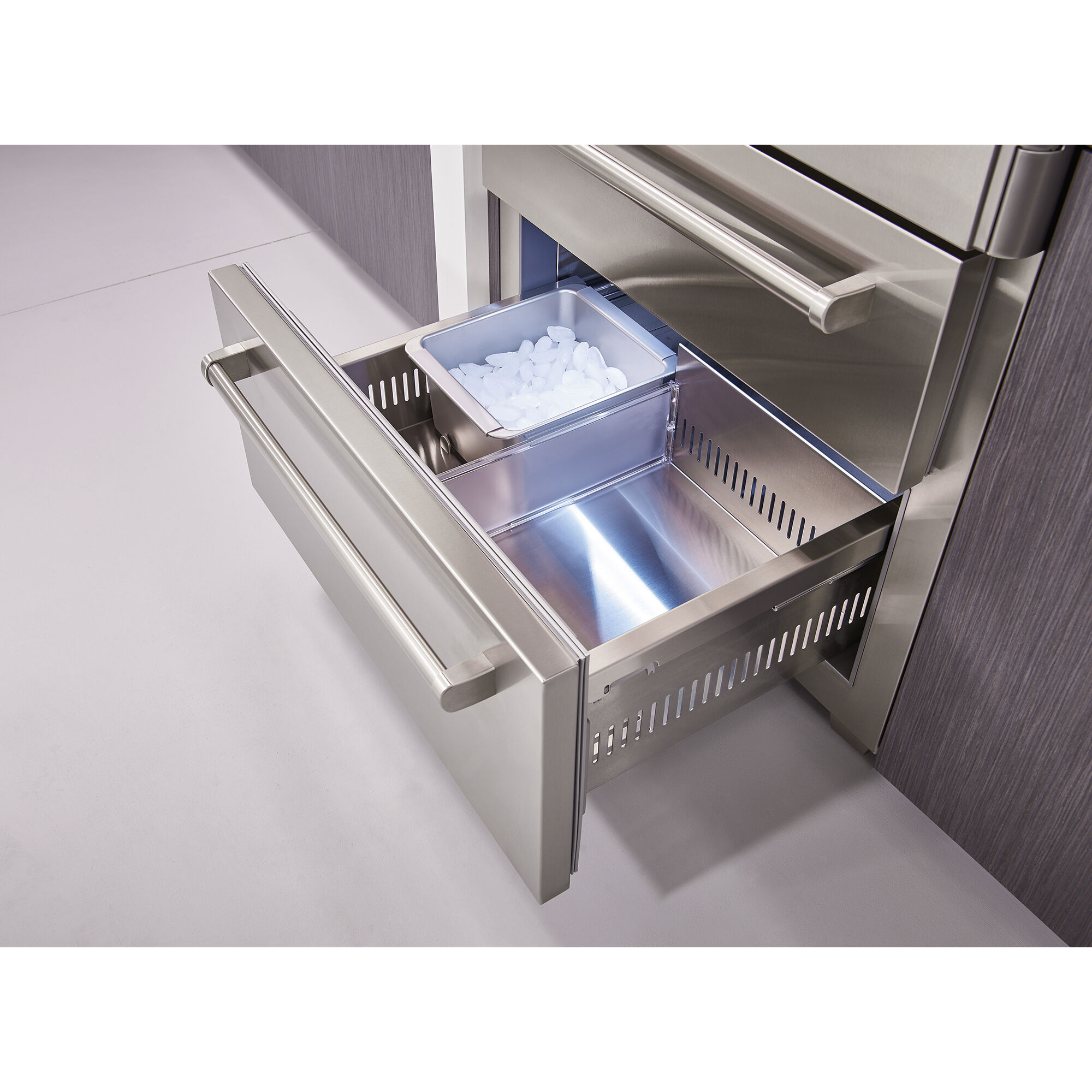 Interior view of Sub-Zero PRO3650GLH showing glass shelving, interior LED lighting, and bottom freezer drawer