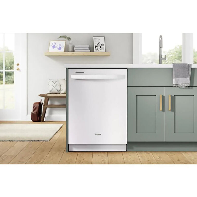 Whirlpool WDT750SAKW 24-inch white top control dishwasher with hidden controls installed under kitchen counter.