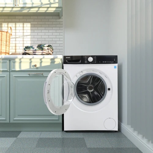 Avanti FLW22V0W front load washer in white with open door revealing stainless steel drum, positioned in modern laundry room with mint green cabinetry, white subway tile backsplash, and folded towels on shelf above.