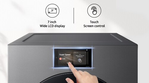 Samsung DV90F Series dark steel electric dryer with a touchscreen control panel, showing a hand selecting options on the 7-inch LCD display.
