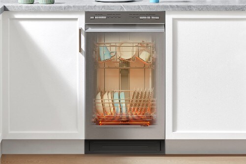 Midea 18-inch stainless steel front control dishwasher installed between white cabinets, demonstrating interior heating system.