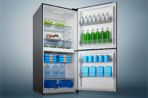 Open Midea 50-50 Flex unit configured for frozen storage, stocked with bottles, cans, boxed items, and ice packs. role=