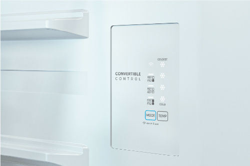 Close-up of the interior convertible control panel with mode and temperature buttons for switching fridge and freezer settings.