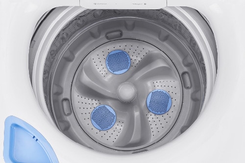 Overhead view of Midea smart washer interior showing stainless steel impeller with three blue accent circles and perforated wash basket design