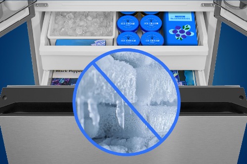 Open freezer drawer of Midea Refrigerator Model MRF23I5AST with ice bin and frozen foods, plus a graphic indicating frost-free performance.