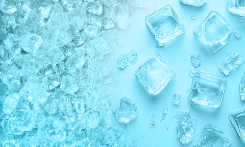 Split view showing crushed ice on left side and cubed ice on right side against light blue background, demonstrating dual ice options available from Midea refrigerator.