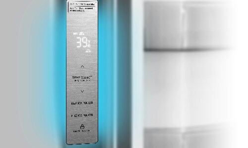 Close-up of Midea refrigerator's digital control panel on French door displaying 39°F temperature with buttons for Temp Select, Ref Ice Maker, Frz Ice Maker, and Door Alarm functions