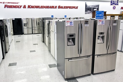 French Door Refrigerators in Front of Refrigerator Stock in Store