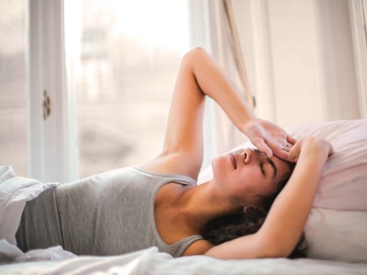 Woman Wearing Gray Tank Top Waking Up