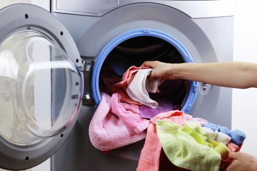 Towels Being Removed from Dryer