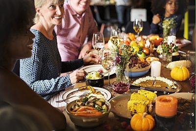 Family at Thanksgiving dinner table