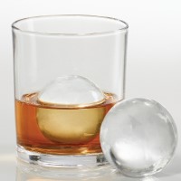 Large Orb of Craft Ice in Whisky Glass