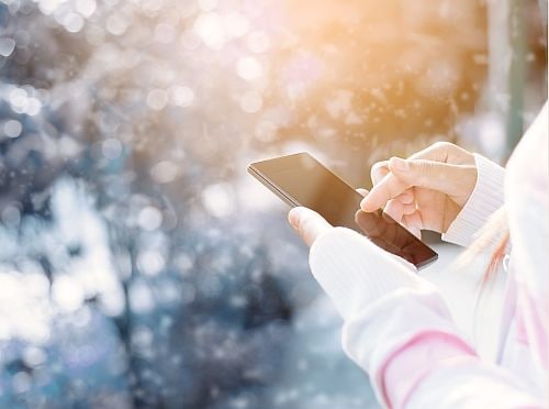 Cell phone outside while snowing 