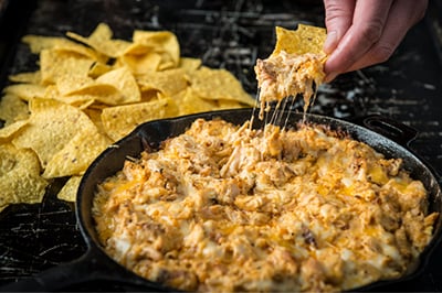 Buffalo Chicken Dip in Skillet with Tortilla Chips