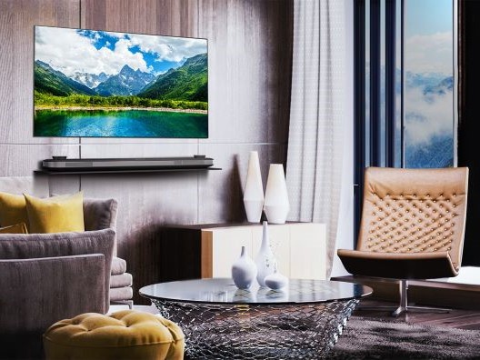 LG OLED TV on Living Room Wall with Mountain Onscreen