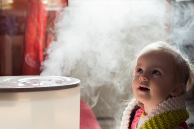 Baby In Awe of Humidifier