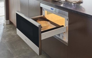 Open Microwave Drawer within Cabinets