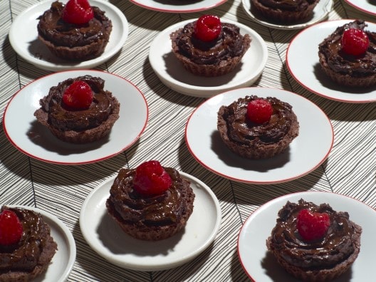 Avocado Mousse Tartlets in plates on a table