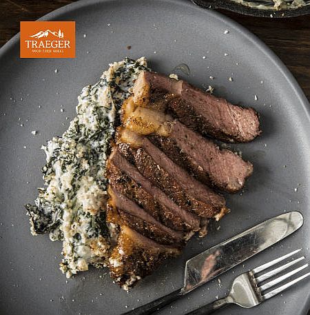 Traeger's Reverse Seared Rib-Eye with Baked Creamed Greens