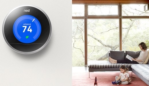 Nest Thermostat in Foreground with Family in Background