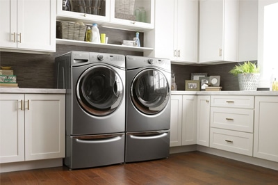 Front-Load Washer and Dryer on Pedestals