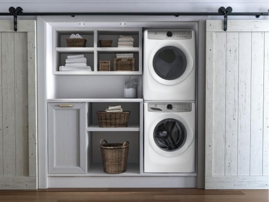 Stackable Laundry Setup Behind Sliding Doors