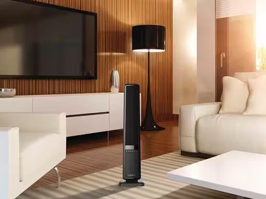Monolith-Like Space Heater in Middle of Living Room Floor