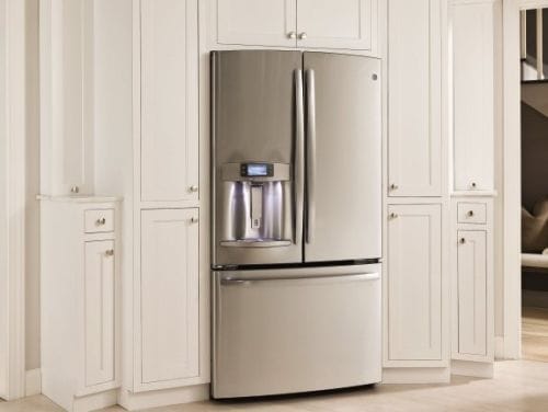 Refrigerator Amongst Cabinetry