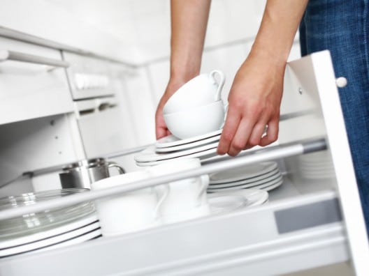 Pile of Plates, Saucers, and Coffee Cups Inside Drawer