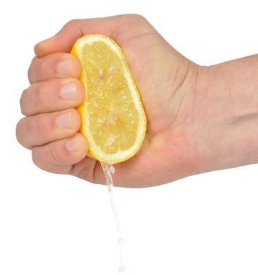 Hand Squeezing a Lemon
